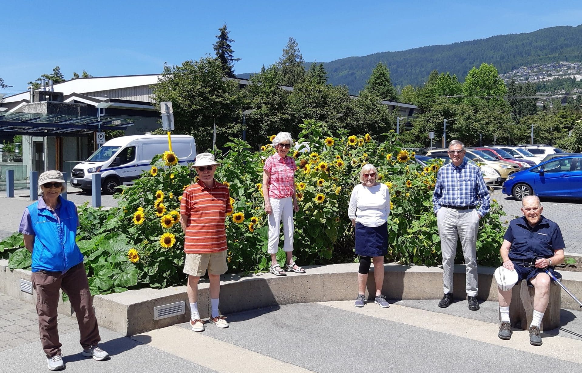PARC residents standing outdoors. Independent Senior Living Community.