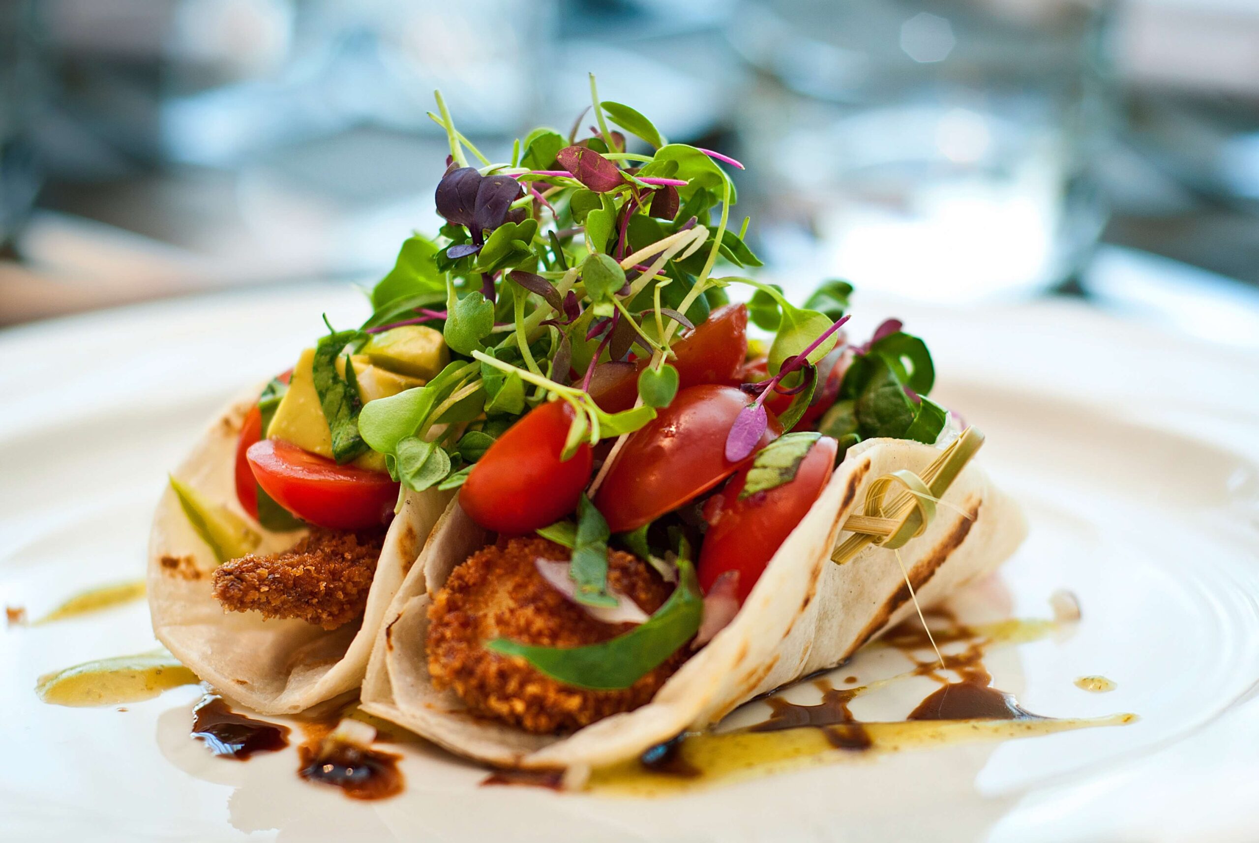 Chef-prepared meals - two tacos on a plate. Best Years. Independent Senior Living.