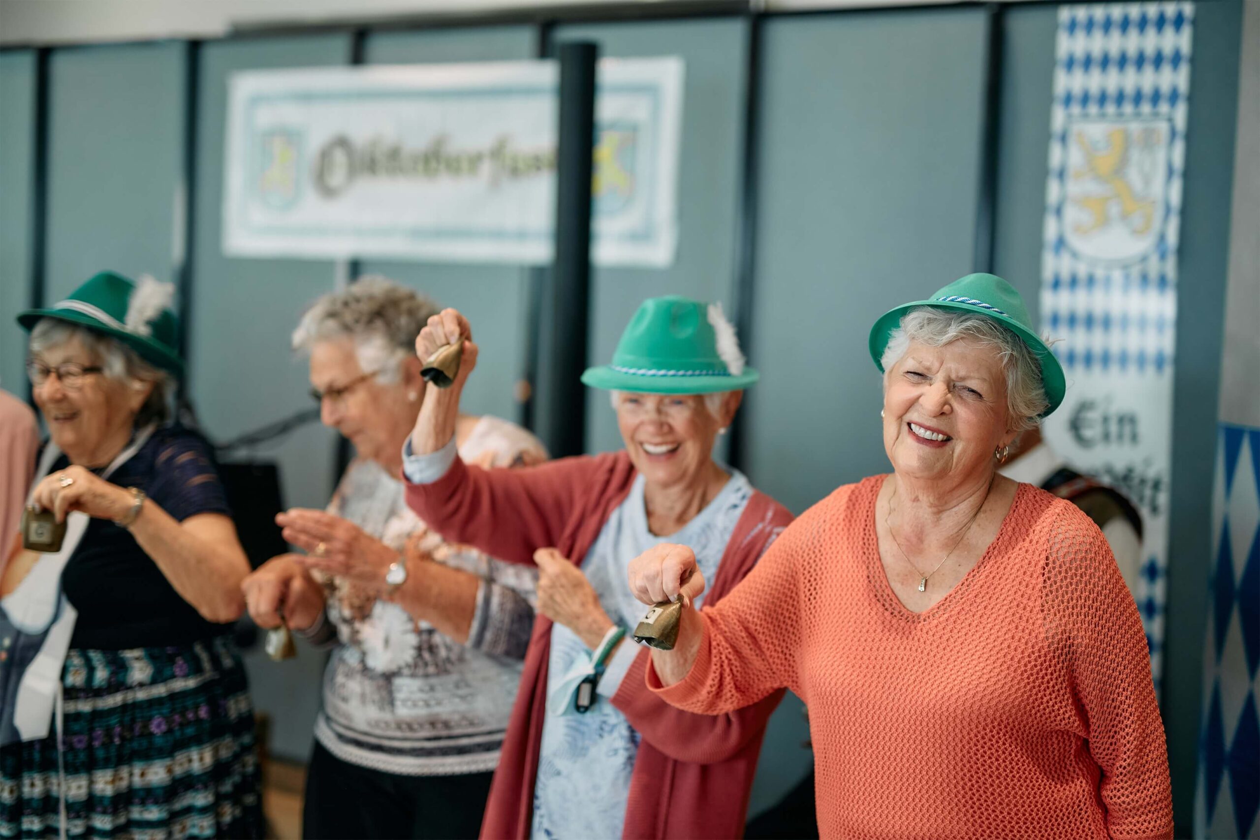 Four senior residents having fun at a themed festivity. Best Years. Independent Senior Living.