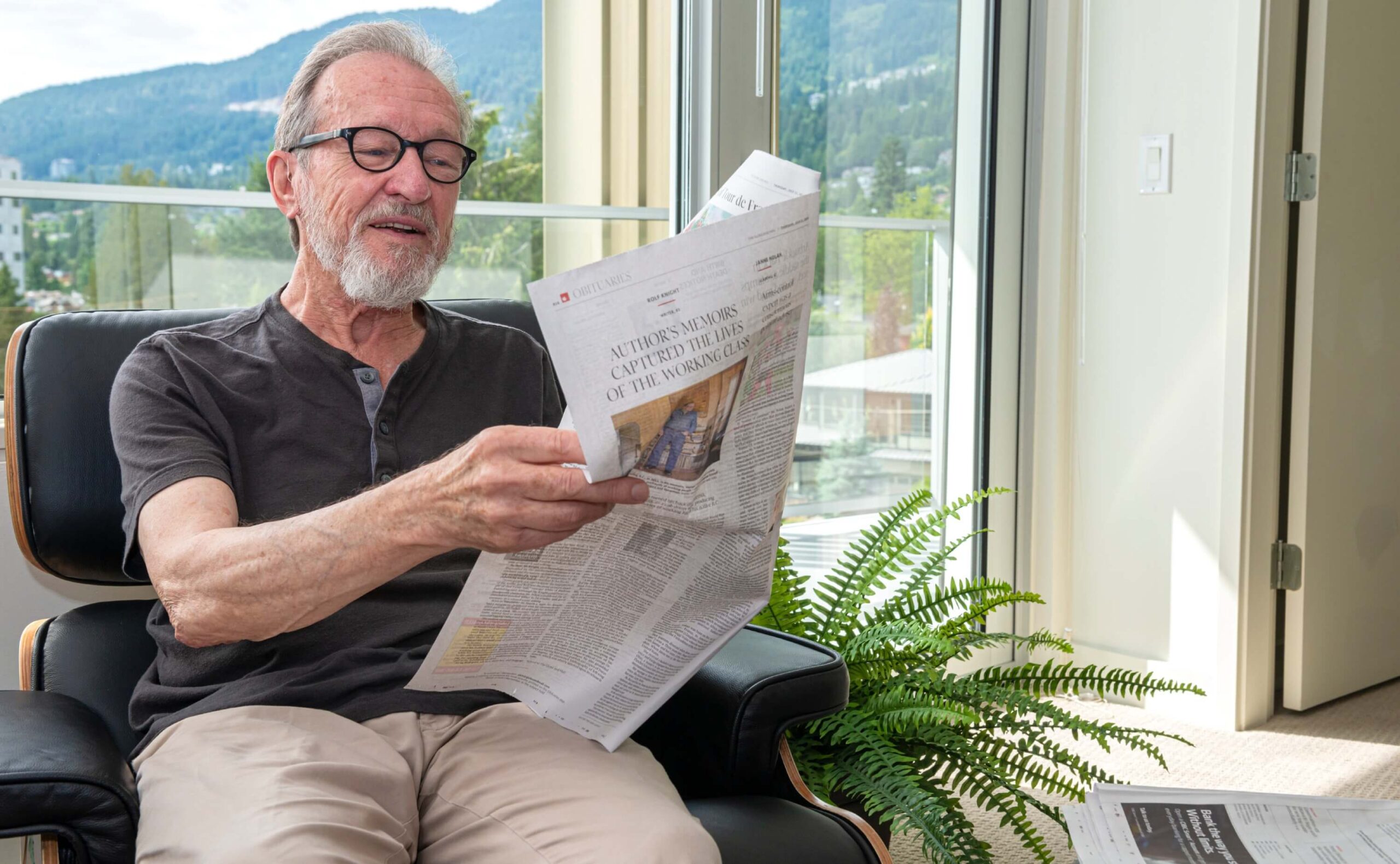 A man reading a newspaper
